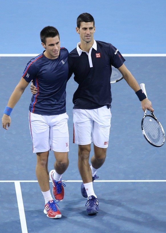 Djordje Djokovic (l.) und Novak Djokovic beim Doppel 2015 in Peking.
