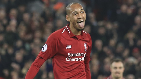 Liverpool's Fabinho celebrates after scoring his side's fourth goal during the English Premier League soccer match between Liverpool and Newcastle at Anfield Stadium, Liverpool, England, Wednesday, De ...