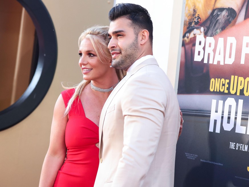 (FILE) Britney Spears Is Engaged to Sam Asghari After Nearly 5 Years Together. HOLLYWOOD, LOS ANGELES, CALIFORNIA, USA - JULY 22: Singer Britney Spears and boyfriend/personal trainer Sam Asghari arriv ...