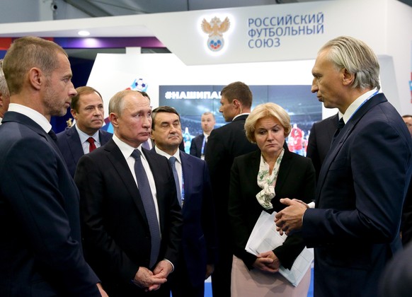 NIZHNY NOVGOROD, RUSSIA - OCTOBER 10, 2019: Russia s President Vladimir Putin 2nd L, Russian Presidential Aide Igor Levitin, Russia s Deputy Prime Minister Olga Golodets, Gazprom Neft CEO and Manageme ...