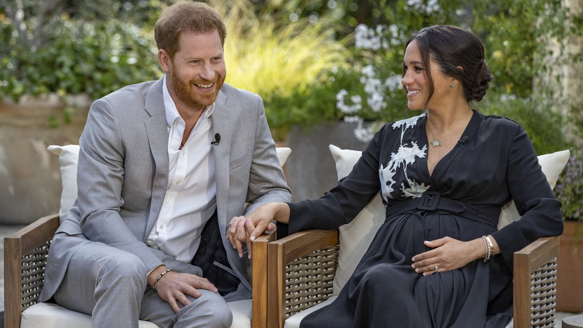 This image provided by Harpo Productions shows Prince Harry, left, and Meghan, Duchess of Sussex, speaking about expecting their second child during an interview with Oprah Winfrey. "Oprah with M ...