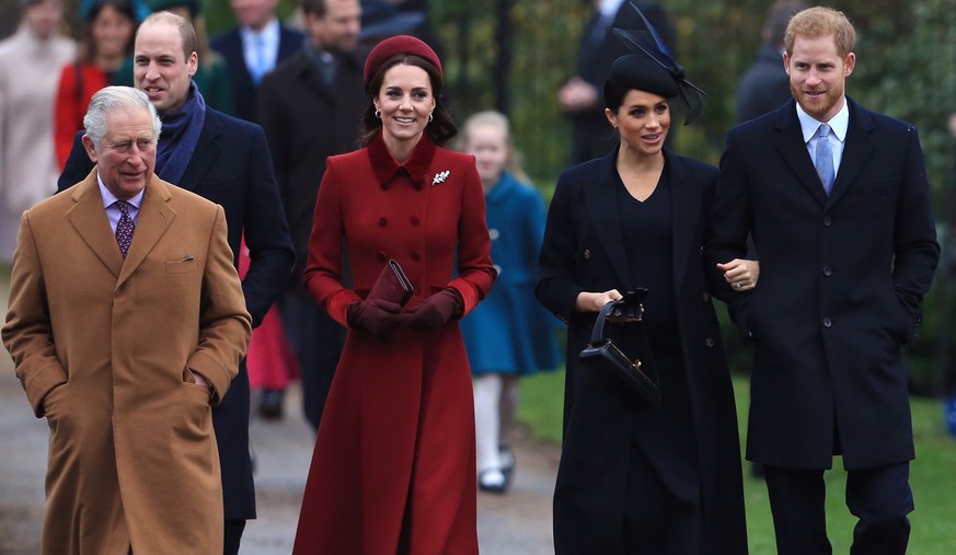 KING&#039;S LYNN, ENGLAND - DECEMBER 25: (L-R) Prince Charles, Prince of Wales, Prince William, Duke of Cambridge, Catherine, Duchess of Cambridge, Meghan, Duchess of Sussex and Prince Harry, Duke of  ...