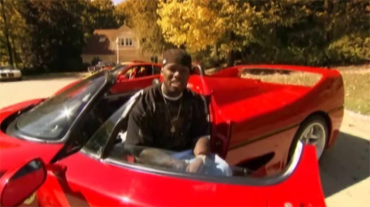 50 Cent mit einem "seiner" Ferraris