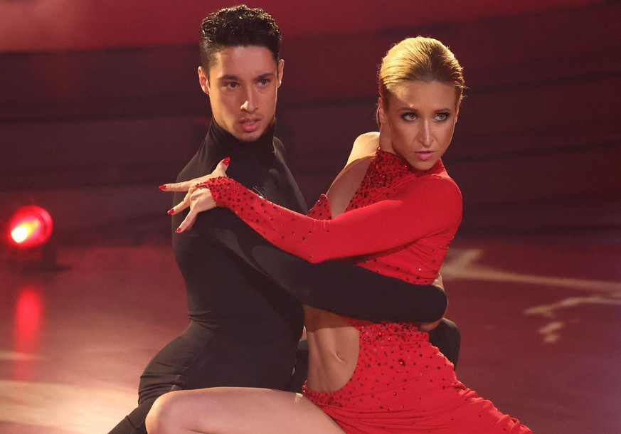 COLOGNE, GERMANY - APRIL 08: Rene Casselly and Kathrin Menzinger perform on stage during the 7th show of the 15th season of the television competition show &quot;Let&#039;s Dance&quot; at MMC Studios  ...