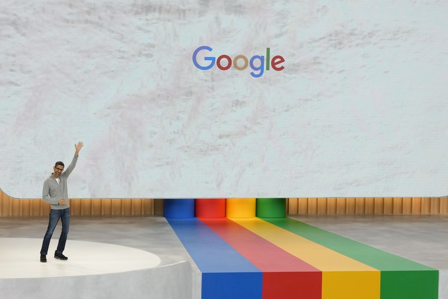 Alphabet CEO Sundar Pichai waves after speaking at a Google I/O event in Mountain View, Calif., Wednesday, May 10, 2023. (AP Photo/Jeff Chiu)