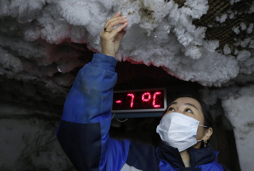 YAKUTSK, SAKHA REPUBLIC YAKUTIA, RUSSIA - OCTOBER 7, 2021: A researcher of the Melnikov Permafrost Institute is at work at an underground lab of the Museum of History of Permafrost Studying at the Mel ...