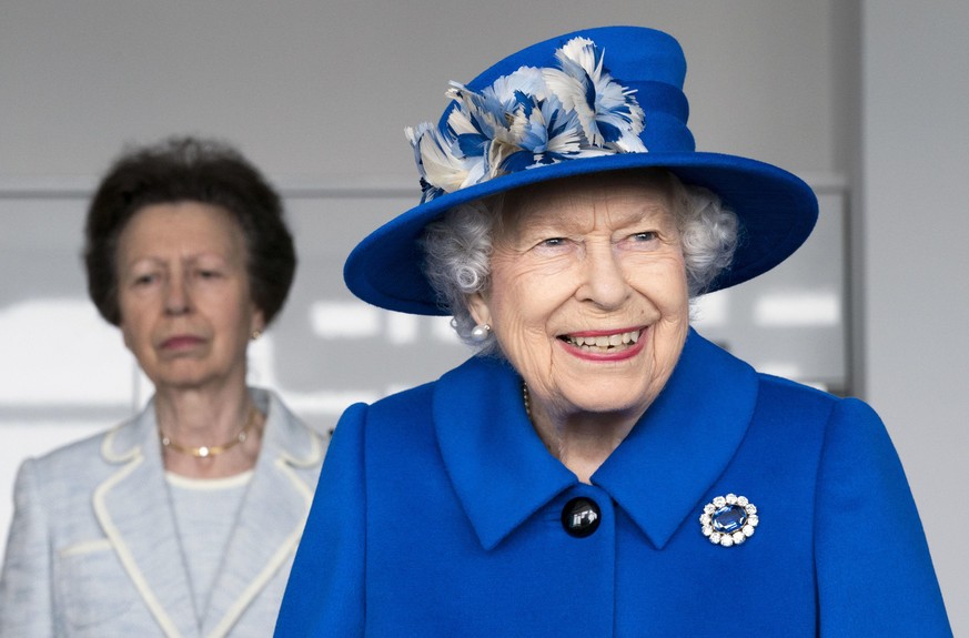 GLASGOW, SCOTLAND - JUNE 30: Queen Elizabeth II and Princess Anne, Princess Royal visit Skypark in Glasgow to receive a briefing from the UK Space Agency and view satellite production, as part of her  ...