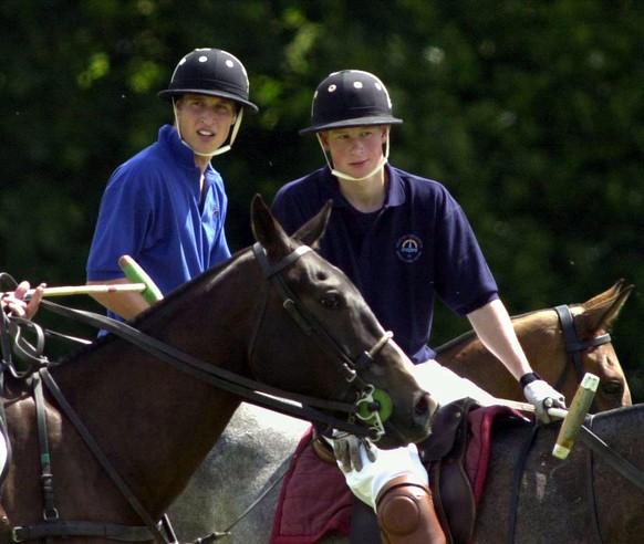 Prince Harry wedding. File photo dated 13/7/2002 of Prince Harry on the Eventers team and Prince William on the Jockeys team take a break whilst playing in the Jockeys v Eventers Charity polo match at ...