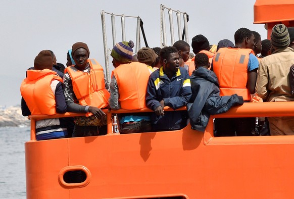 Arrival of 48 people of sub-Saharan origin in Almeria, after being rescued by Maritime Salvage near the Alboran island, in Almeria, Andalusia, Spain, 03 July 2018. Rescue of 48 people from a second di ...