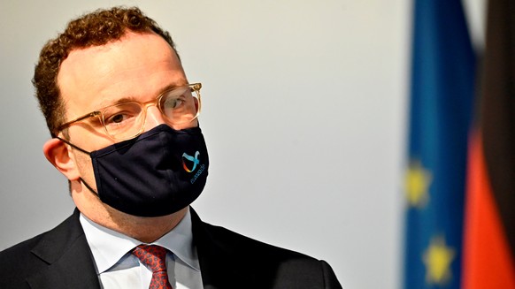 German Health Minister Jens Spahn wears a face mask as he arrives for a videoconference with EU health ministers in Berlin, German July 16, 2020. Tobias Schwarz/Pool via REUTERS