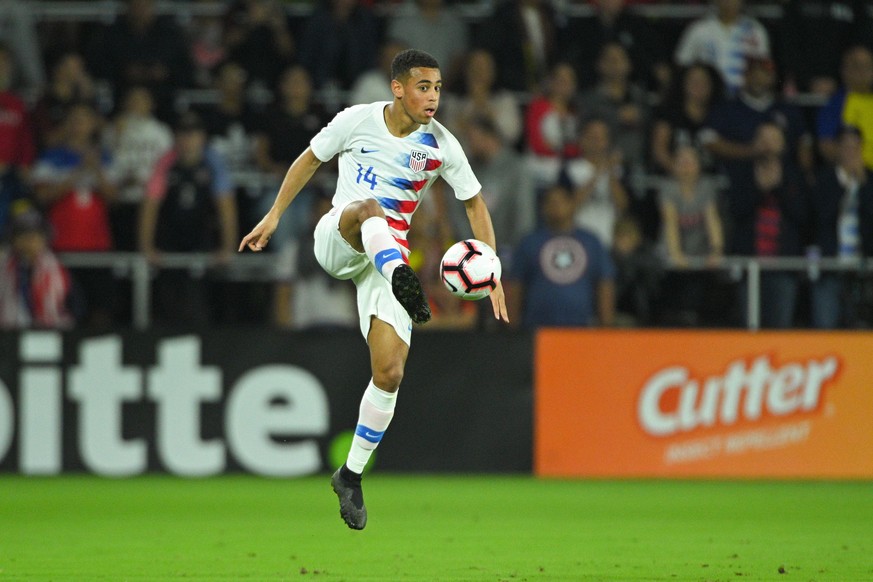 March 21, 2019 - Orlando, Florida, USA - US midfielder Tyler Adams (14) in action during an international friendly between the US and Ecuador at Orlando City Stadium on March 21, 2019 in Orlando, Flor ...