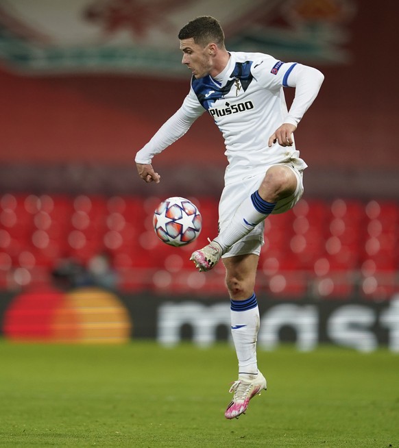 Atalanta&#039;s Robin Gosens attempts to control the ball during the Champions League group D soccer match between Liverpool and Atalanta at Anfield stadium in Liverpool, England, Wednesday, Nov. 25,  ...