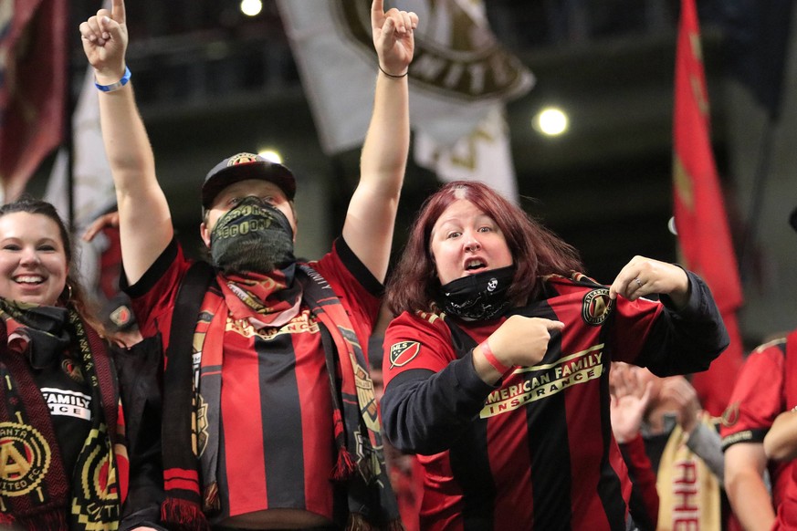 ATLANTA, GA - DECEMBER 08: Atlanta United FC fans celebrate after winning the MLS Fussball Herren USA Cup over the Portland Timbers on December 8, 2018 at the Mercedes-Benz Stadium in Atlanta, GA. (Ph ...