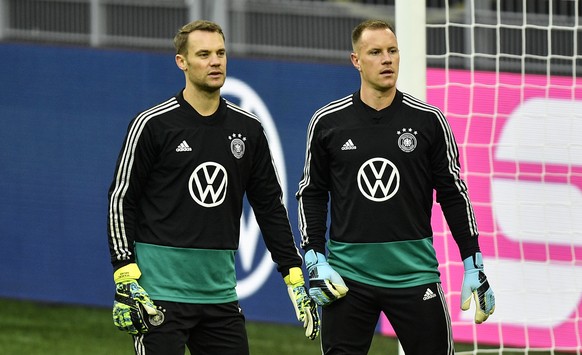 Germany&#039;s goalkeepers Marc-Andre ter Stegen, right, and Manuel Neuer exercise during a training session of the national team on Tuesday, Oct. 8, 2019, prior a friendly soccer match between German ...