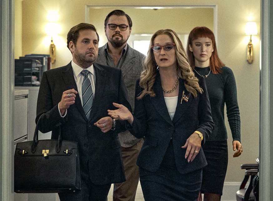 This image released by Netflix shows Jonah Hill, from left, Leonardo DiCaprio, Meryl Streep and Jennifer Lawrence in &quot;Don&#039;t Look Up.&quot; (Niko Tavernise/Netflix via AP)
