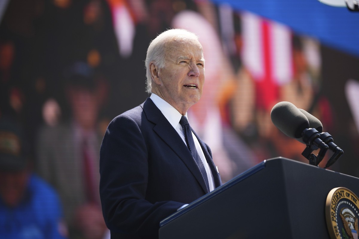 President Joe Biden delivers a speech during a commemorative ceremony to mark D-Day 80th anniversary, Thursday, June 6, 2024 at the US cemetery in Colleville-sur-Mer, Normandy. Normandy is hosting var ...