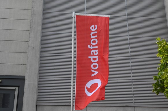 Logo, Schriftzug von Vodafone auf der ANGA COM, Europas führende Kongressmesse für Breitband, Fernsehen und Online. *** Logo, lettering of Vodafone at ANGA COM, Europes leading congress fair for broad ...