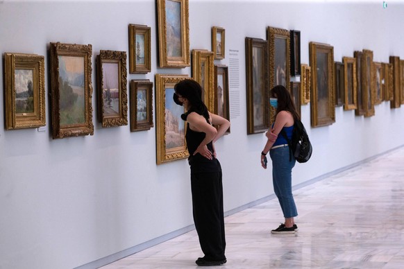210514 -- ATHENS, May 14, 2021 -- People visit the National Gallery in Athens, Greece, on May 14, 2021. All the museums in Greece reopened for the public on Friday as the strict measures against COVID ...