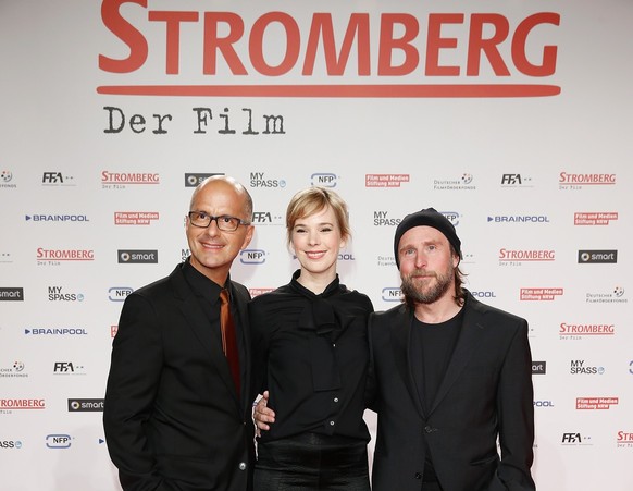 COLOGNE, GERMANY - FEBRUARY 18: (L-R) Christoph Maria Herbst, Milena Dreissig and Bjarne I. Maedel attend the World premiere of Stromberg - Der Film at Cinedom Koeln on February 18, 2014 in Cologne, G ...