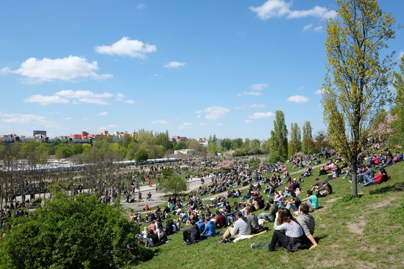 Berlin, Germany - april 30, 2017: People at park (Mauerpark) on a sunny day in Berlin, Germany.