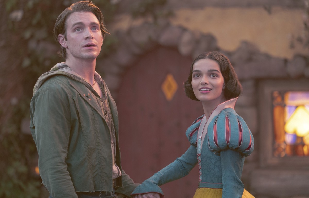 This image released by Disney shows Andrew Burnap, left, and Rachel Zegler in a scene from &quot;Snow White.&quot; (Disney via AP)