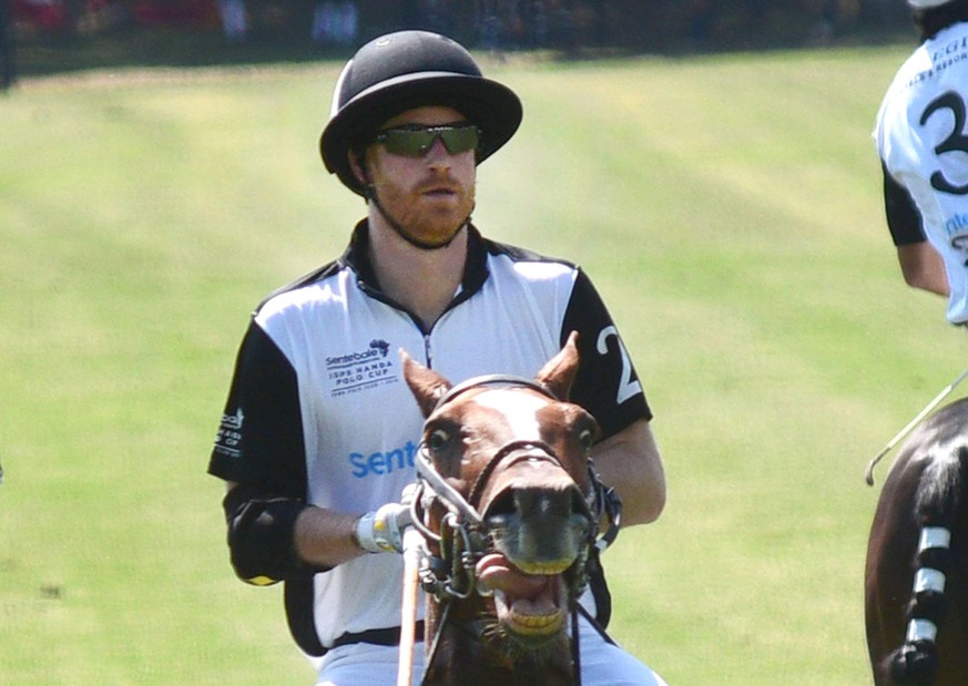 Prince Harry is a passionate polo player.  The photo shows him at a previous game.