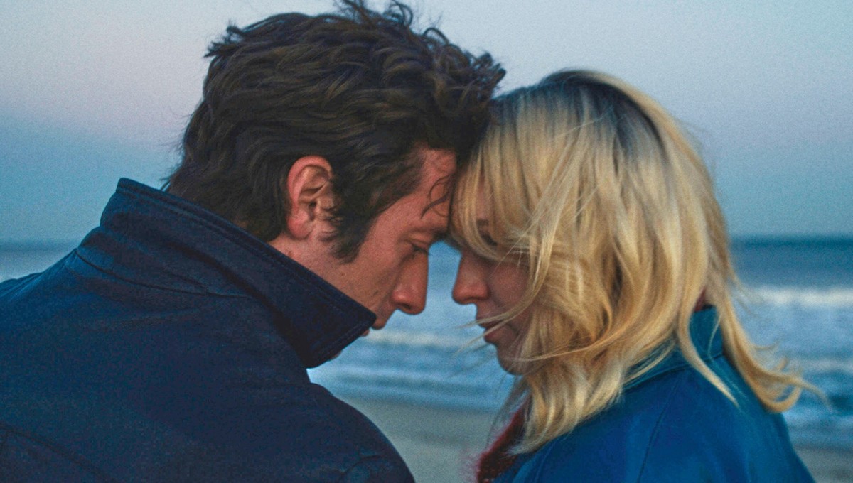 This image released by Disney shows Jeremy Allen White as Bruce Springsteen, left, and and Odessa Young as Faye, in a scene from &quot;Springsteen: Deliver Me From Nowhere.&quot; (20th Century Studios ...