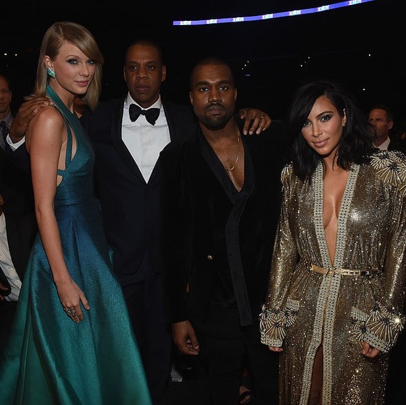 LOS ANGELES, CA - FEBRUARY 08: (L-R) Recording Artists Taylor Swift, Jay Z and Kanye West and tv personality Kim Kardashian attend The 57th Annual GRAMMY Awards at the STAPLES Center on February 8, 20 ...