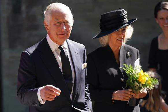 Britain's King Charles III and Camilla, the Queen Consort leave following a Service of Prayer and Reflection for the life of Queen Elizabeth II, at Llandaff Cathedral in Cardiff, Wales, Friday Sept. 1 ...