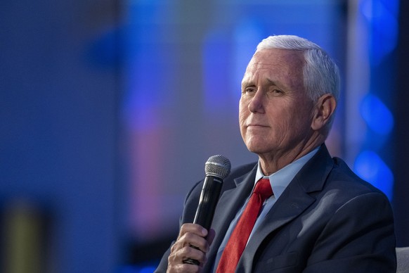 Former Vice President Mike Pence pauses while speaking at the Federalist Society Executive Branch Review conference, Tuesday, April 25, 2023, in Washington. (AP Photo/Alex Brandon)
