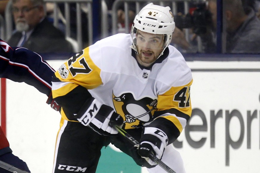 FILE - Pittsburgh Penguins forward Adam Johnson in action during an NHL hockey game in Columbus, Ohio, Friday, Sept. 22, 2017. Police in England arrested a man on Tuesday, Nov. 14, 2023, under suspicion of...