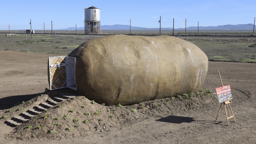 IMAGE DISTRIBUTED FOR IDAHO POTATO COMMISSION - The Big Idaho® Potato Hotel, a 6-ton, 28-foot long, 12-foot wide and 11.5-foot tall spud made of steel, plaster and concrete, is firmly planted in an ex ...