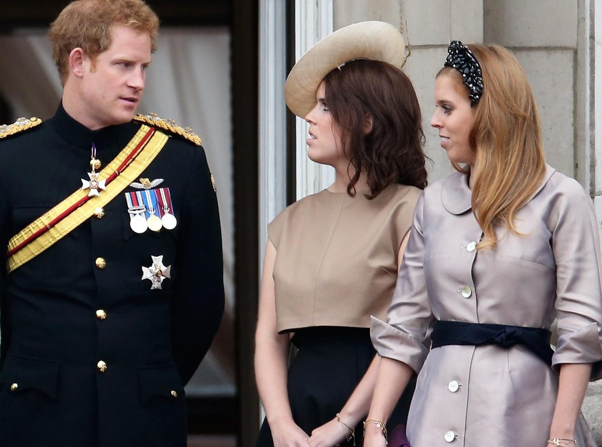 LONDON, ENGLAND - JUNE 13: (L-R) Prince Andrew, Duke of York, Catherine, Duchess of Cambridge, Camilla, Duchess of Cornwall, Prince Harry, Princess Eugenie and Princess Beatrice stand on the balcony o ...