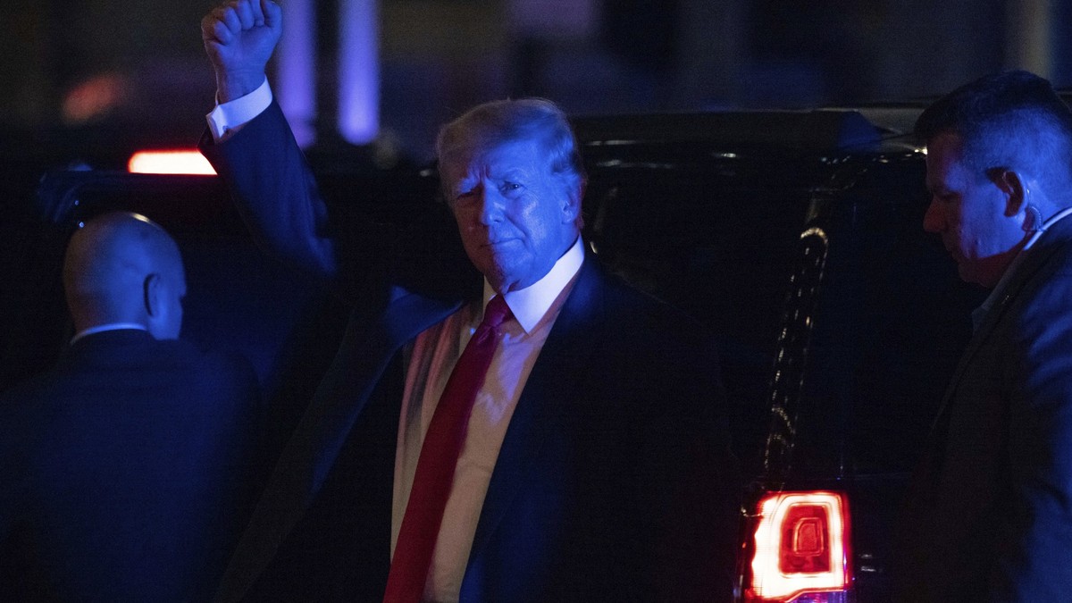 Former President Donald Trump walks into Trump Tower, late Tuesday, Aug. 9, 2022, in New York. (AP Photo/Yuki Iwamura)