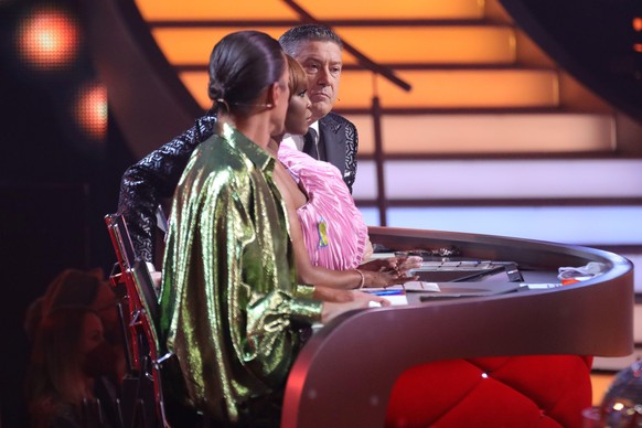 COLOGNE, GERMANY - MARCH 11: Judges Jorge Gonzalez, Motsi Mabuse and Joachim Llambi are seen on stage during the 3rd show of the 15th season of the television competition show &quot;Let&#039;s Dance&q ...