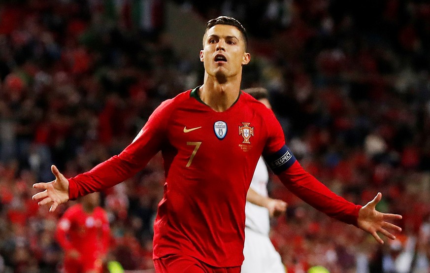 Soccer Football - UEFA Nations League Semi Final - Portugal v Switzerland - Estadio do Dragao, Porto, Portugal - June 5, 2019 Portugal&#039;s Cristiano Ronaldo celebrates scoring their third goal to c ...