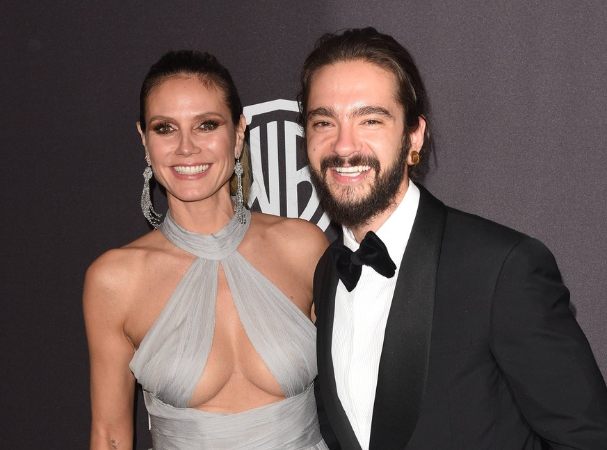 BEVERLY HILLS, CA - JANUARY 06: Heidi Klum (L) and Tom Kaulitz attend the 2019 InStyle and Warner Bros. 76th Annual Golden Globe Awards Post-Party at The Beverly Hilton Hotel on January 6, 2019 in Bev ...