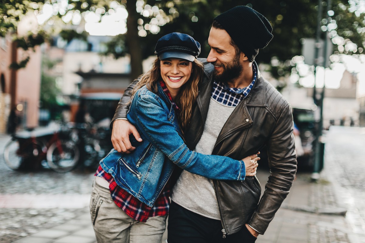Close up of a happy young couple enjoying city life.