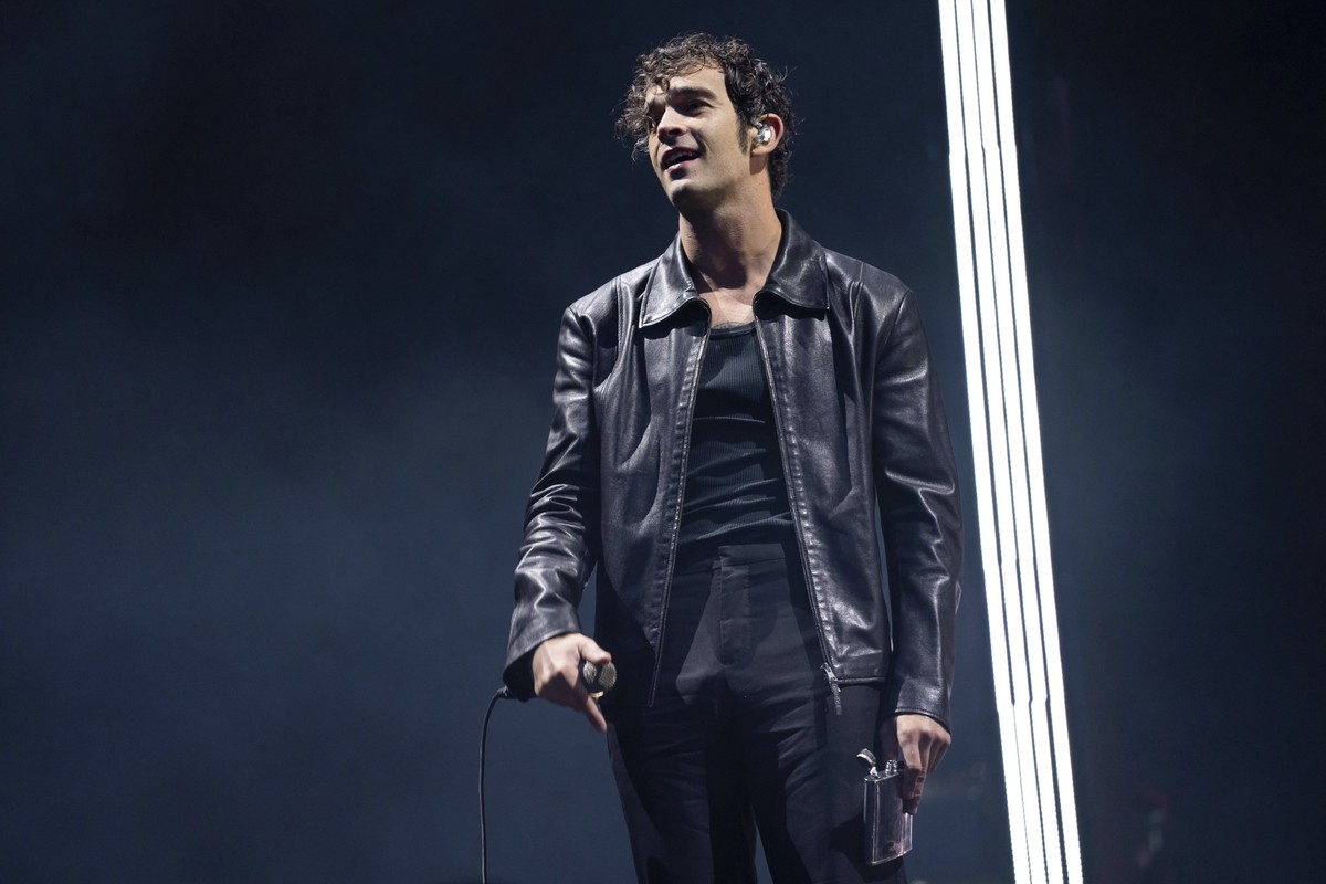 Matthew Healy of The 1975 performs at the Reading Music Festival, England, Saturday, Aug. 26, 2023. (Photo by Scott Garfitt/Invision/AP)