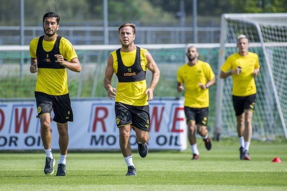 Sport Bilder des Tages Fu�ball: Saison 2018/2019, Trainingslager von Borussia Dortmund am 04.08.2018 im Ri Au in Bad Ragaz (Schweiz). Dortmunds Nuri Sahin (l.) und Dortmunds Mario G�tze / Goetze laufe ...