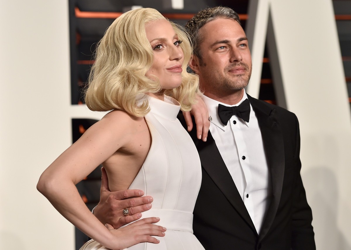 BEVERLY HILLS, CA - FEBRUARY 28: Recording artist Lady Gaga and actor Taylor Kinney attend the 2016 Vanity Fair Oscar Party Hosted By Graydon Carter at the Wallis Annenberg Center for the Performing A ...