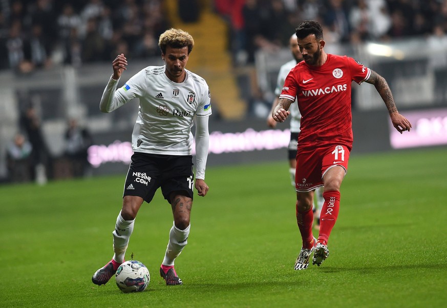 Dele Alli L of Besiktas and Guray Vural R of Antalyaspor during the Turkish Super League football match between Besiktas and Antalyaspor at Vodafone Park in Istanbul , Turkey on February 26 , 2023. Ph ...