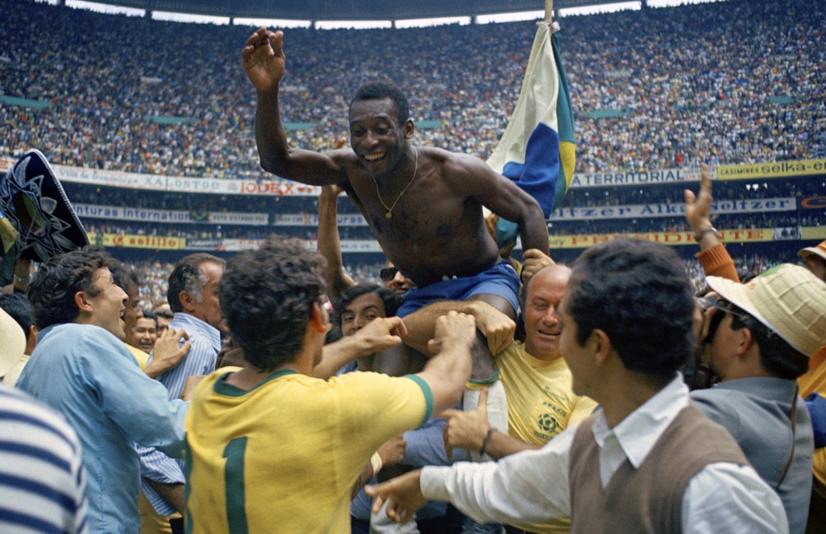 FILE - Brazil&#039;s Pele is hoisted on the shoulders of his teammates after Brazil won the World Cup final against Italy, 4-1, in Mexico City&#039;s Estadio Azteca, June 21, 1970. Pelé, the Brazilian ...
