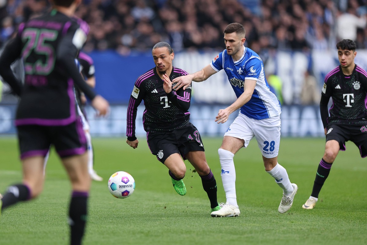 16.03.2024, Fussball Bundesliga, SV Darmstadt 98 - FC Bayern M�nchen, emonline, emspor, despor, v.l., Leroy Sane FC Bayern M�nchen, Bartol Franjic SV Darmstadt 98 DFL/DFB REGULATIONS PROHIBIT ANY USE  ...