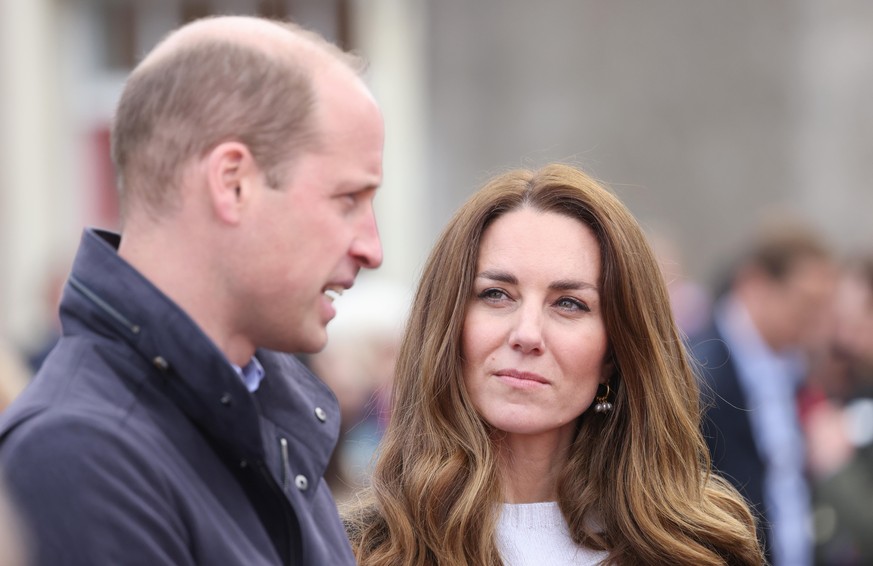 FIFE, SCOTLAND - MAY 26: Prince William, Duke of Cambridge and Catherine, Duchess of Cambridge speak with local fishermen and their families to hear about the work of fishing communities on day six of ...