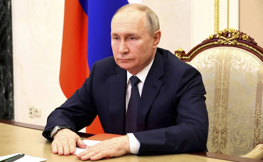 December 22, 2023, Moscow, Moscow Oblast, Russia: Russian President Vladimir Putin chairs a meeting of the permanent members of the Security Council from the Kremlin, December 22, 2023 in Moscow, Russ ...