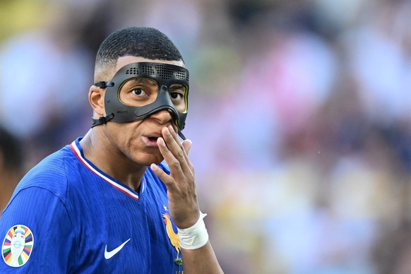 Archivio - 25 giugno 2024, Nord Reno-Westfalia, Dortmund: Calcio, Euro 2024, Campionato Europeo, Francia - Polonia, turno preliminare, Gruppo D, Turno 3, Stadio Dortmund, reazione della Francia Kylian Mbappé.  (Agenzia di stampa tedesca: 