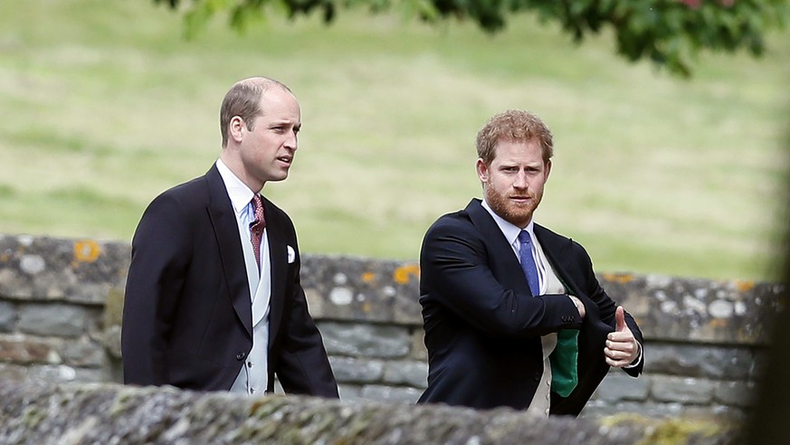 ENGLEFIELD, ENGLAND - MAY 20: Britain's Prince William, left, and his brother Prince Harry arrive for the wedding of Pippa Middleton and James Matthews at St Mark's Church on May 20, 2017 in Englefiel ...