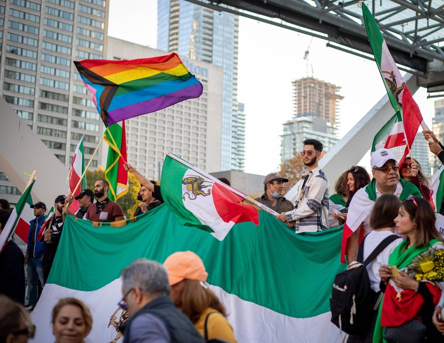 Thousands Rally In Support Of Anti-government Protesters In Iran Thousands of Iranian-Canadians and their supporters protest Iranian Islamic regime at Nathan Phillips Square in Toronto, Canada on Octo ...