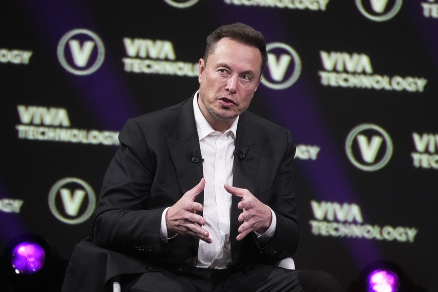 FILE - Elon Musk, who owns Twitter, Tesla and SpaceX, speaks at the Vivatech fair, June 16, 2023, in Paris. Thousands of people logged complaints about problems accessing Twitter on Saturday, July 1,  ...